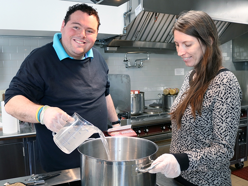 Daniel and Emily Wing, Vista Program Instructor, assisting with Thanksgiving preparations