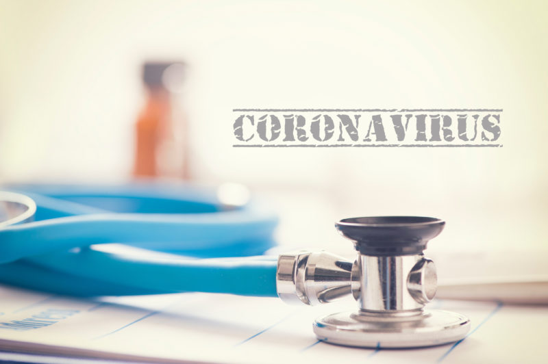 Coronavirus. Stethoscope on the table in medical health clinic.