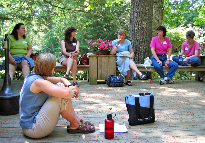 Moms sharing their experiences and feelings at the annual Reflecting on the Journey retreat