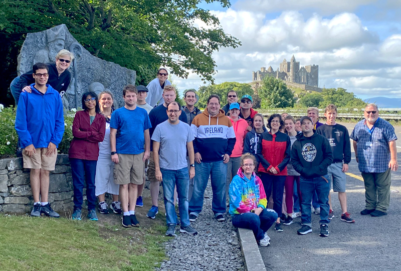 A tour group in front of the Rock of Cashel in Tipperary, Ireland