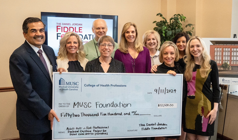 The MUSC-CHP team with Linda J. Walder and Dr. Ava Jayne Fiddle at the check presentation ceremony on September 11, 2024 in memory of Danny Fiddle’s birthday