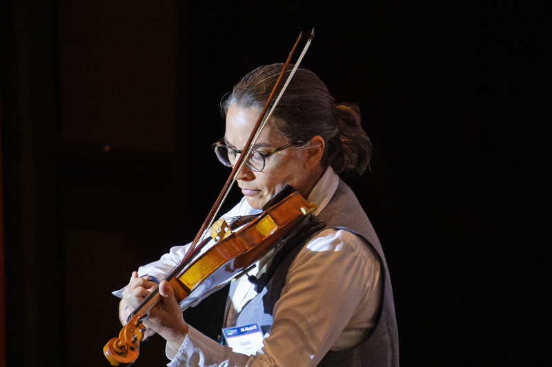 Laura Nadine performing at the 2023 First Place Global Symposium. Photo credit: Good Eye! Media