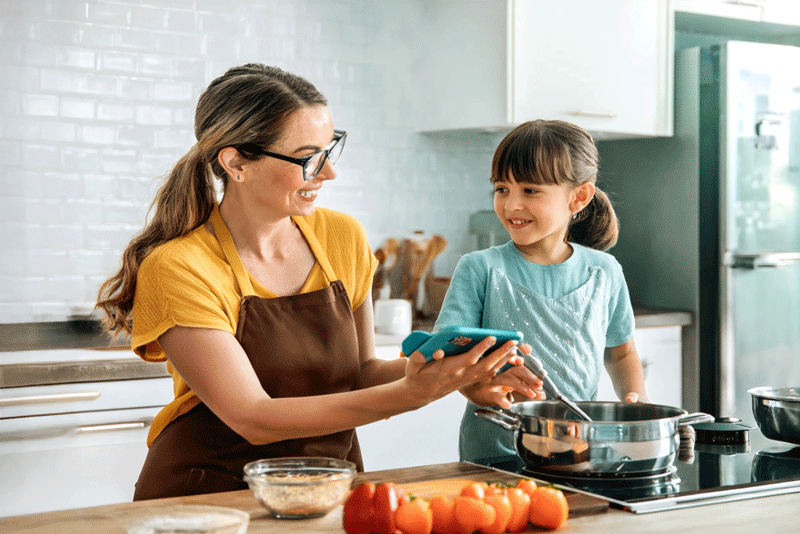 AI Image Mother and Daughter Cooking with Communication Device