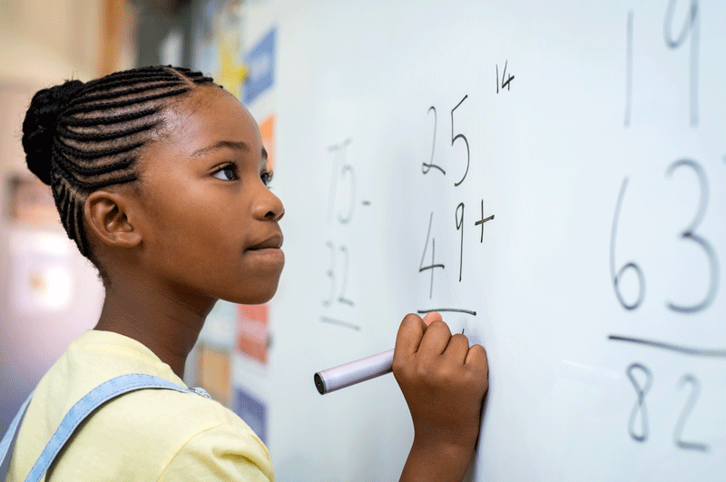 Girl solving mathematical addition for math education