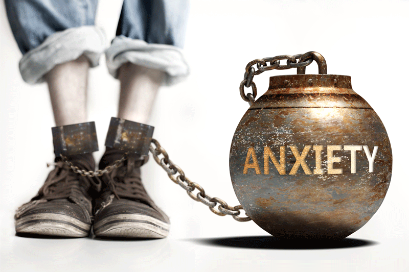 Anxiety role and impact symbolized by a heavy prisoner's weight attached to a person, 3d illustration