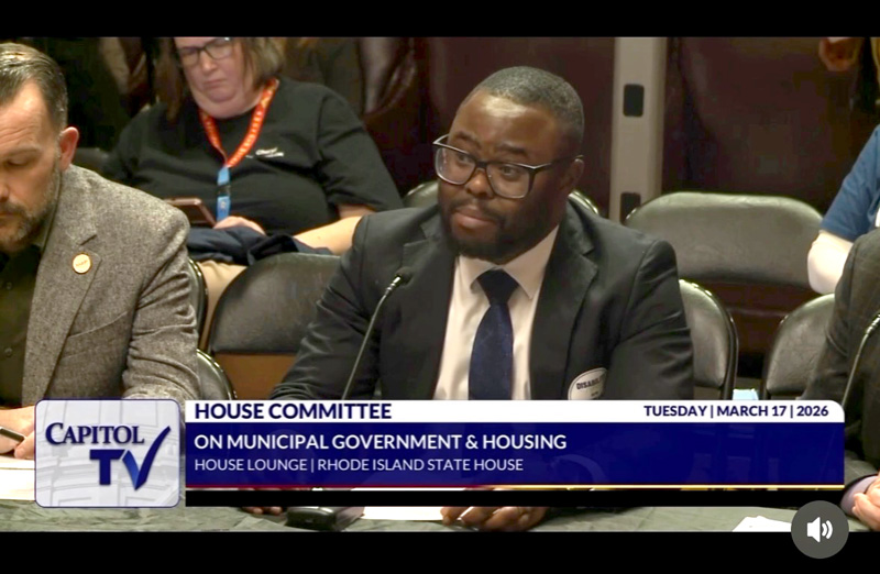 Dr. Adusu testifying at Rhode Island House Committee on Municipal Government and Housing.