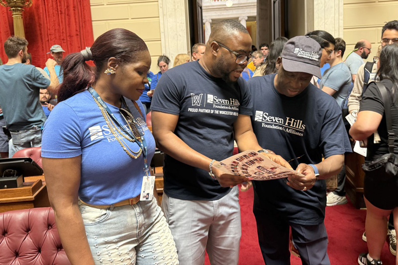 Dr. Adusu with his Team on the Floor of the Rhode island House of Representatives