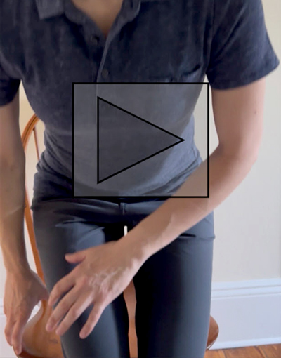 Video depicting the direction "Sit down," that uses the learner's exact chair from her home