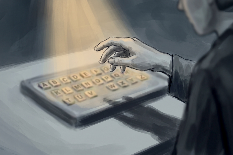 Hand Hovering Over Letterboard